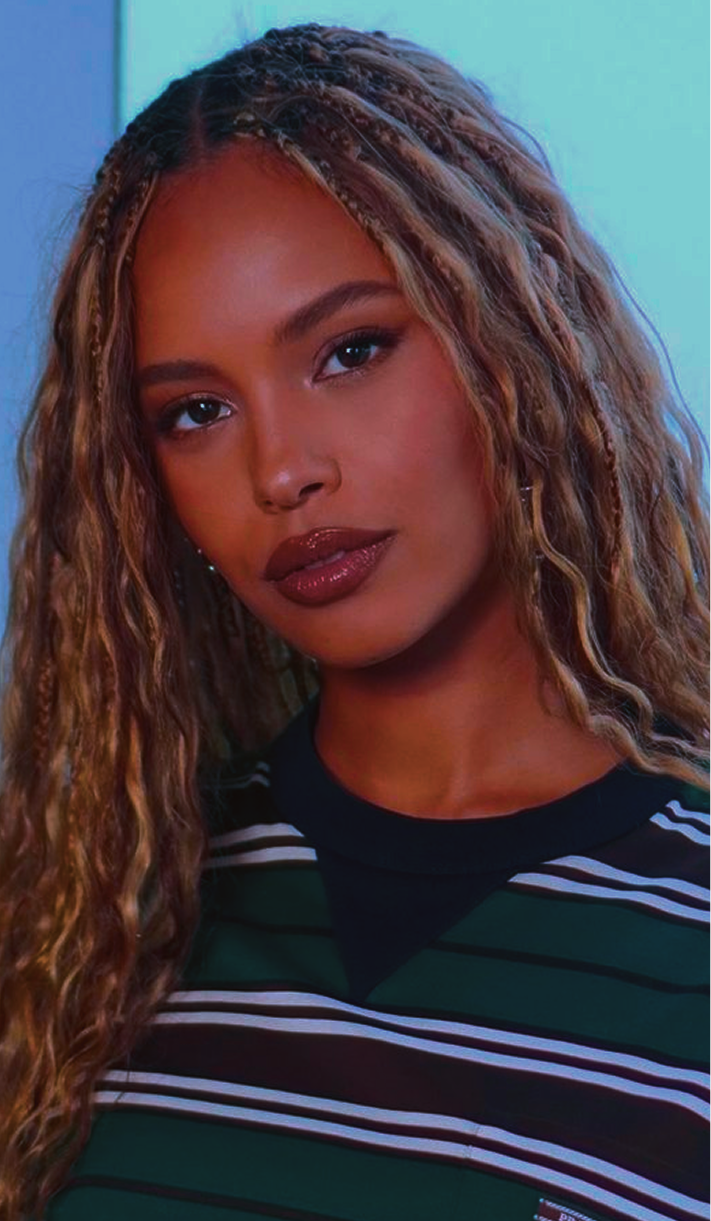 Woman with honey blonde braided hair